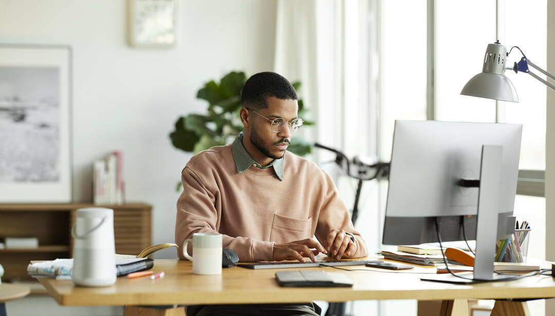 Man sitting at computer working