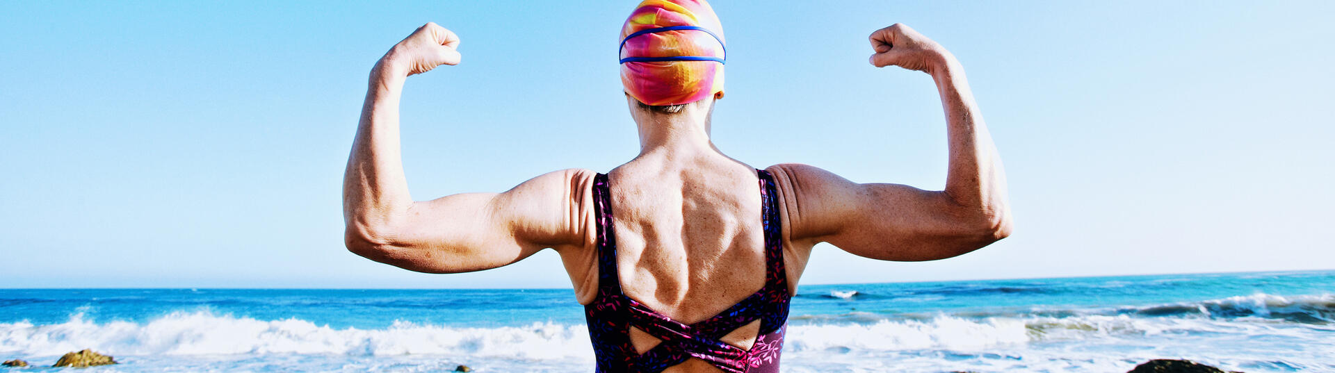 women flexing her muscles