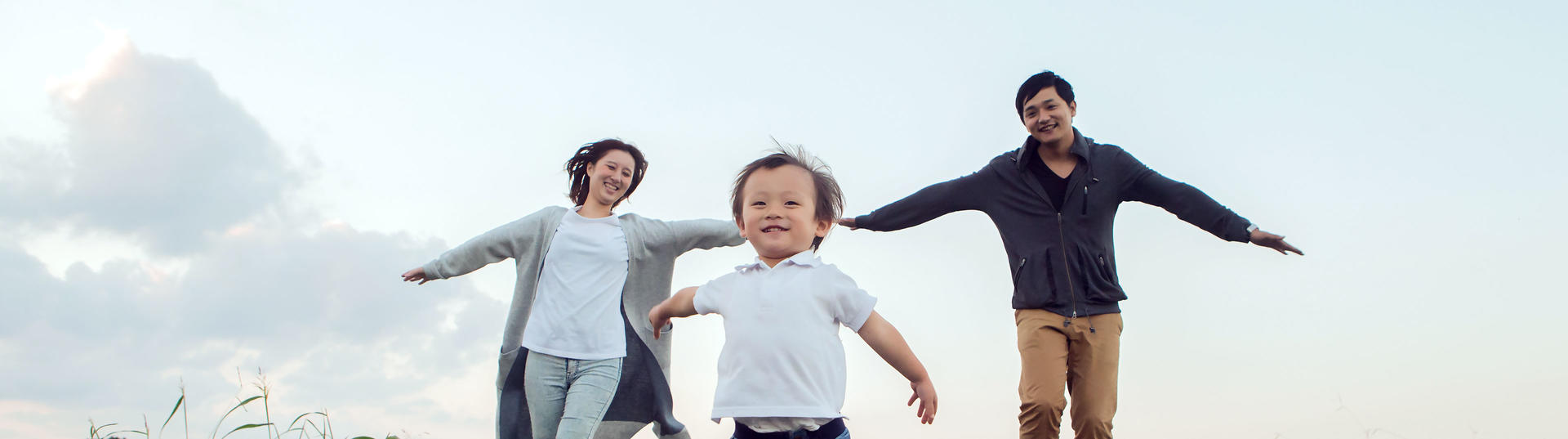 family pretending to be airplanes